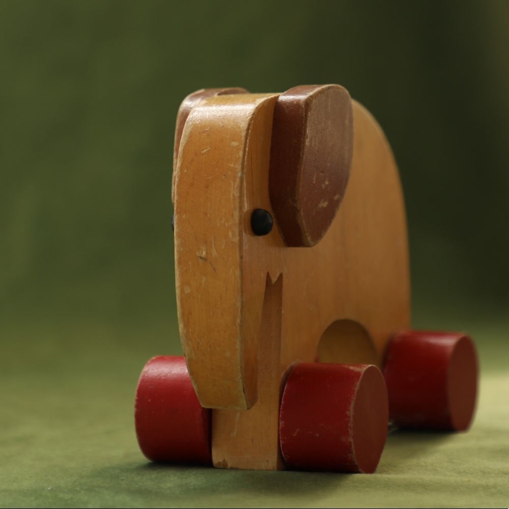 Vintage Wooden Elephant Toy on wheels